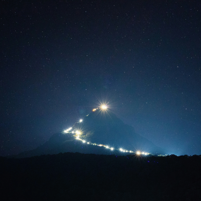 Pilgrims climbing Adam’s Peak trail before dawn