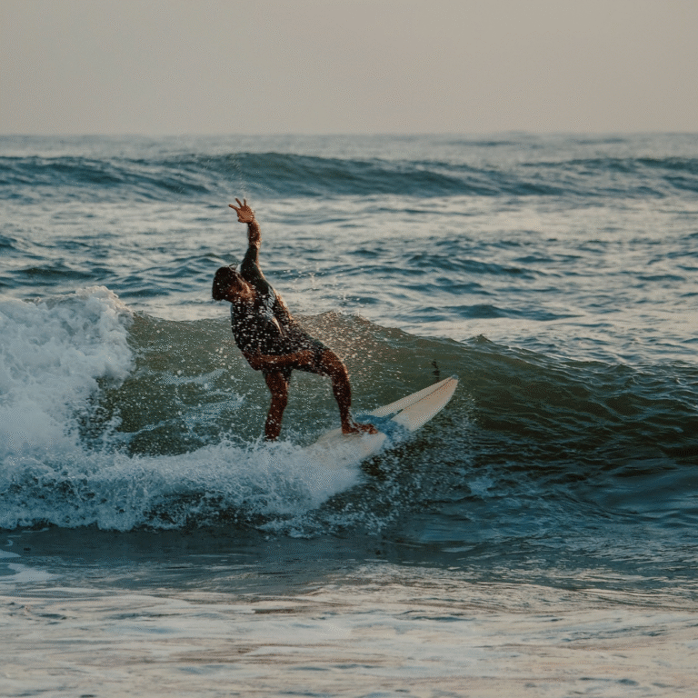 Surfers riding waves at the famous Arugam Bay surf point