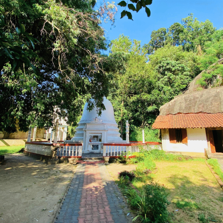 Ancient Buddhist temple Athkanda Viharaya surrounded by greenery