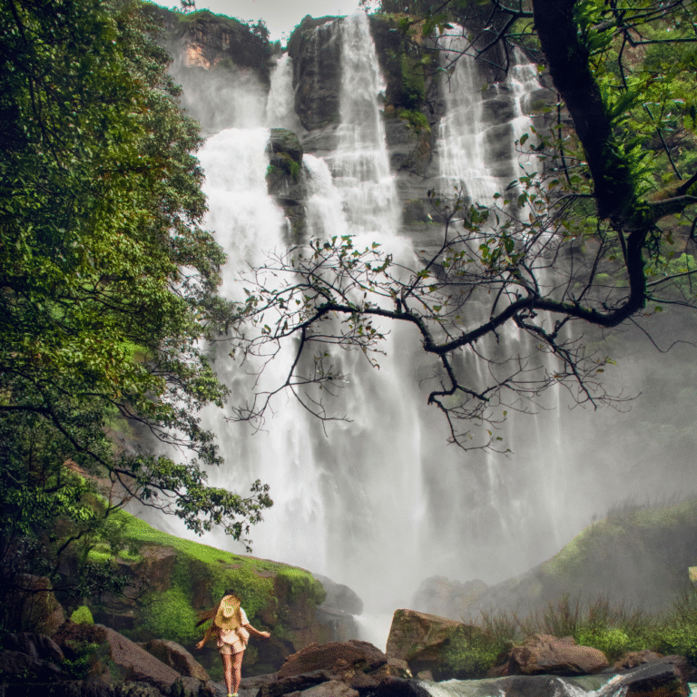 Bomburu Ella Waterfall cascading down lush green hills in Sri Lanka