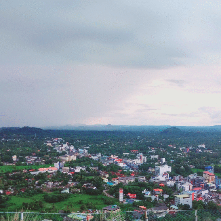 Athugala Viharaya with panoramic views of the surrounding hills.
