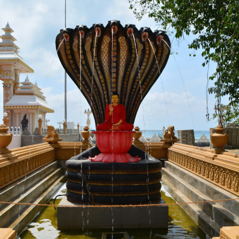 Historical Buddhist site of Nagadeepa under a bright blue sky