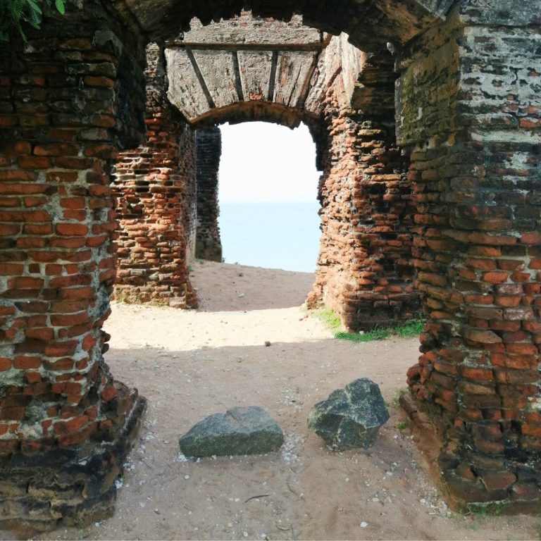 Colonial-era Doric Bungalow structure surrounded by coastal scenery
