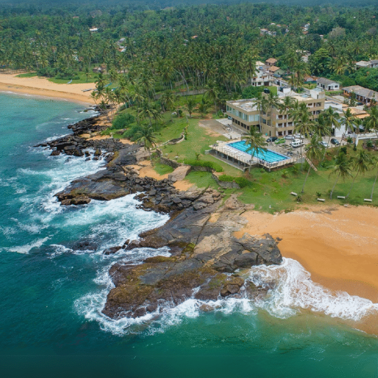 Aerial view of the turquoise sea and coastline of Hikkaduwa
