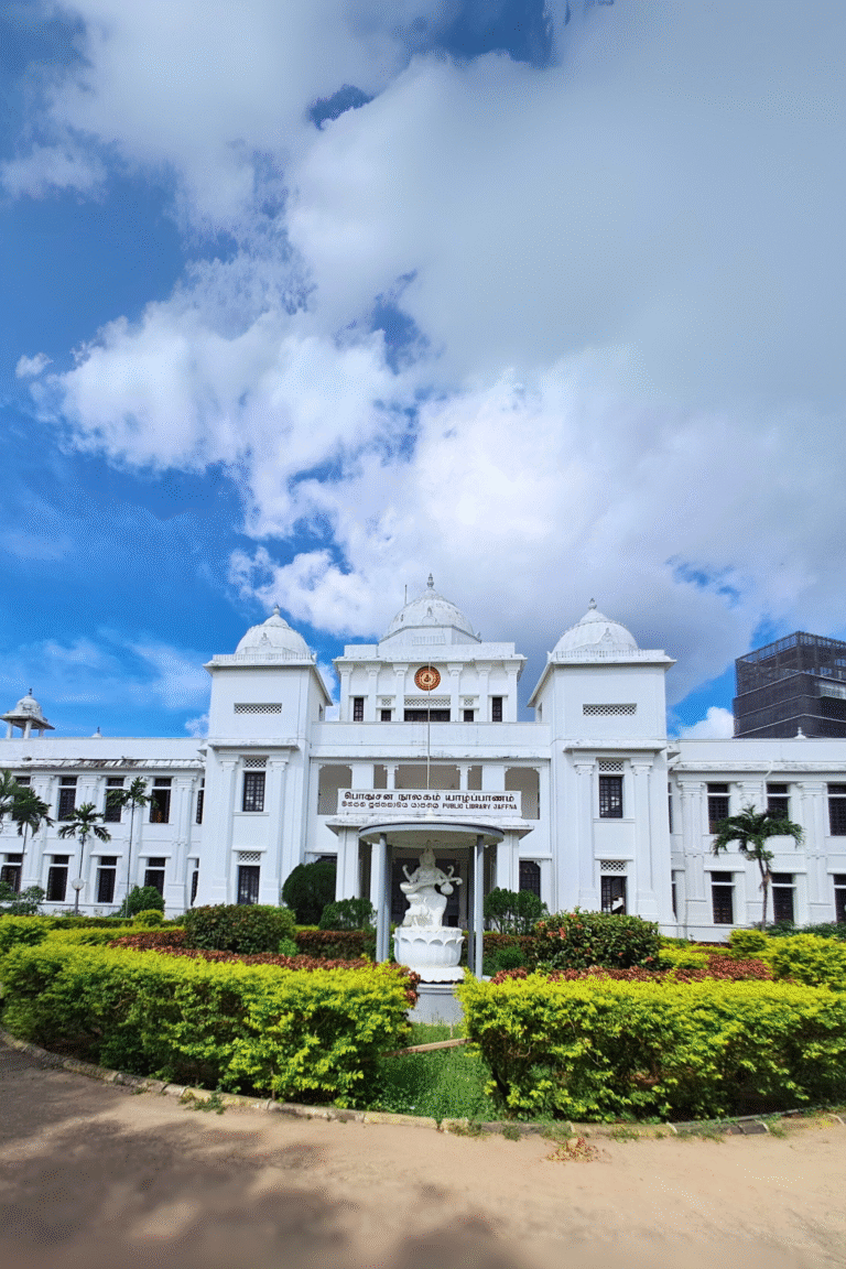 Jaffna Public Library with its iconic white domes under a clear sky.