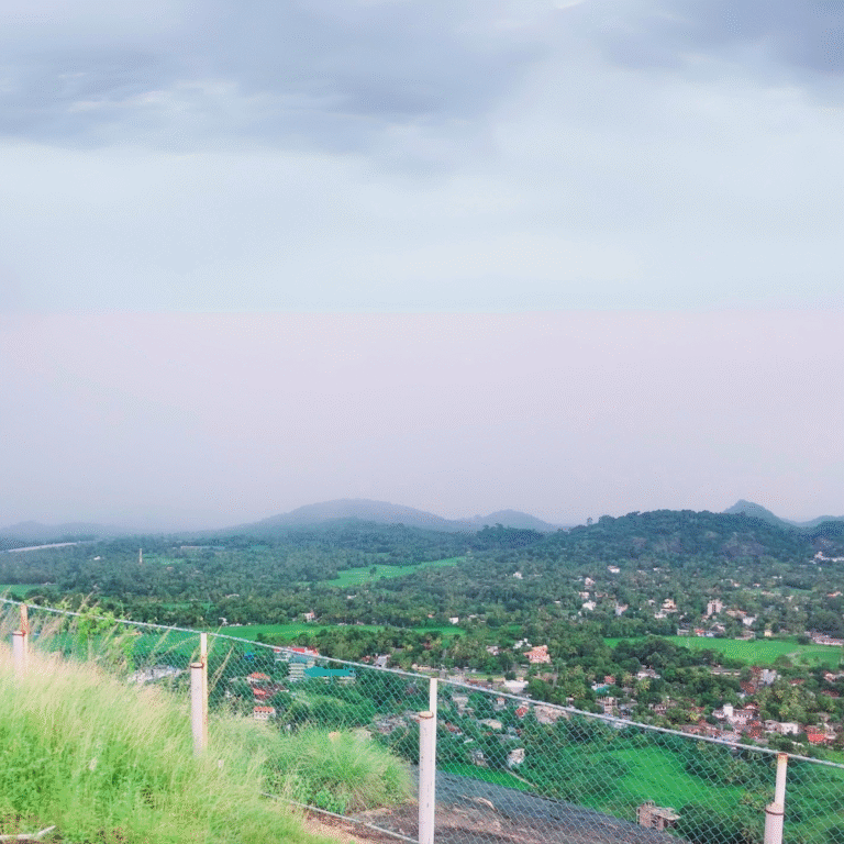 Scenic aerial view of Athugala rock temple in Sri Lanka at sunrise.