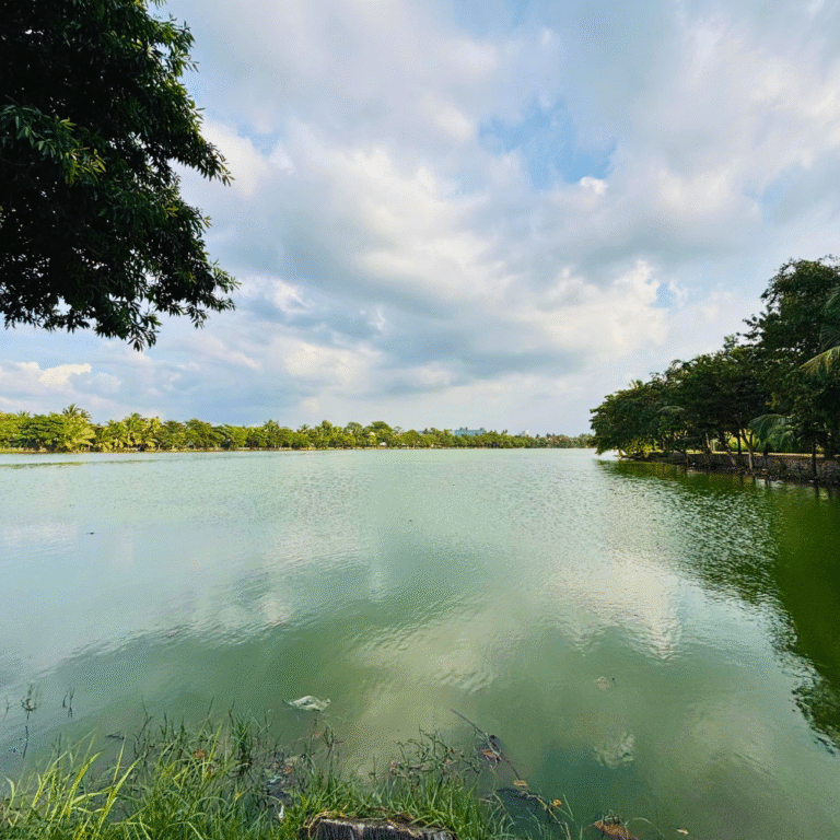Sunset reflections on Lunawa Lagoon’s glassy surface