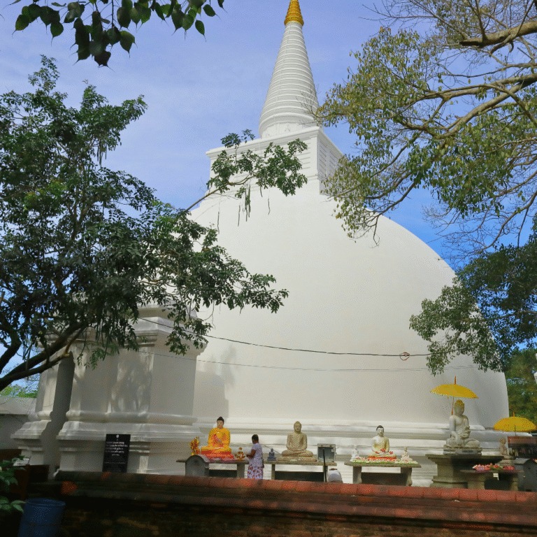 Sacred stupa at Somawathi temple under clear blue sky