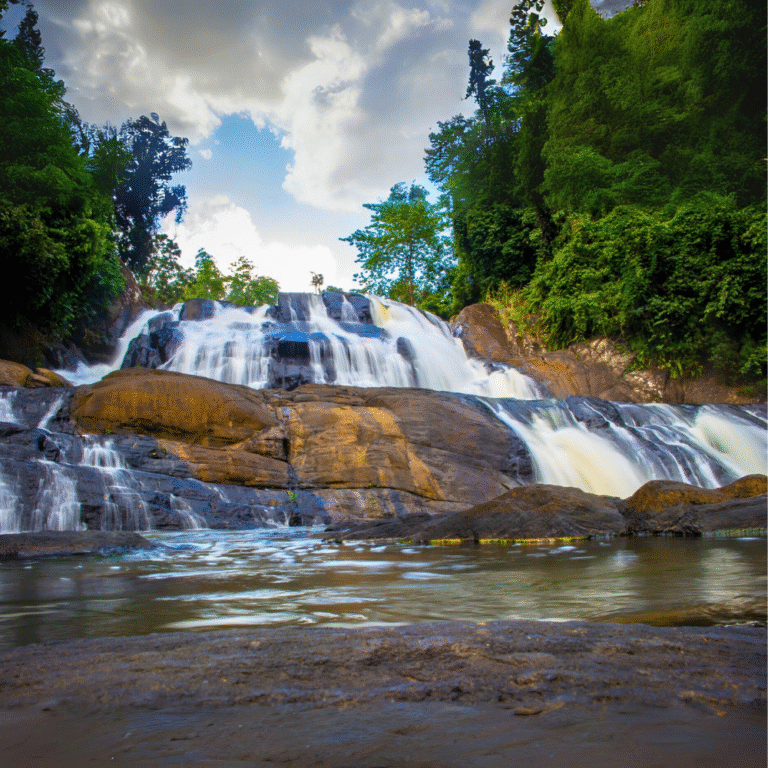 Sathmala Ella Waterfall in Sri Lanka surrounded by lush greenery