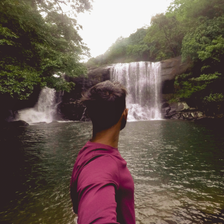 Sera Ella Waterfall surrounded by lush greenery