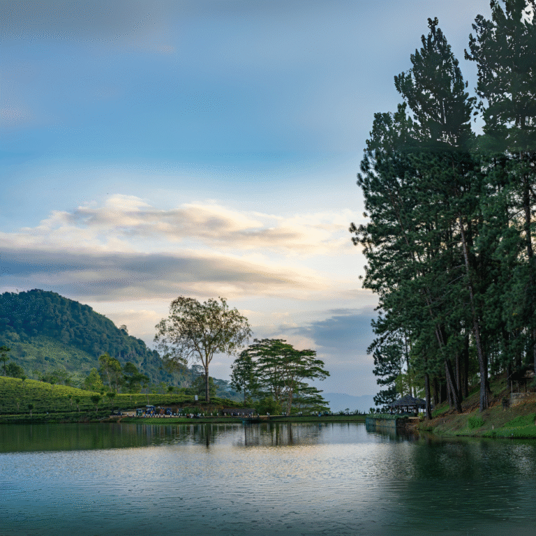 Calm waters of Sembuwatta Lake under a blue sky