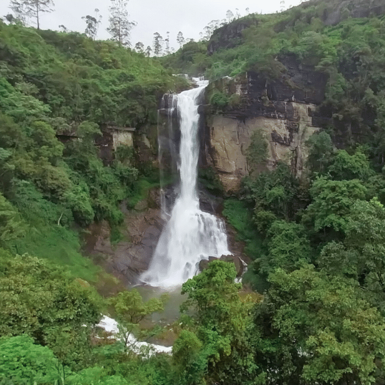 Clear water flowing down Ramboda Falls in Nuwara Eliya