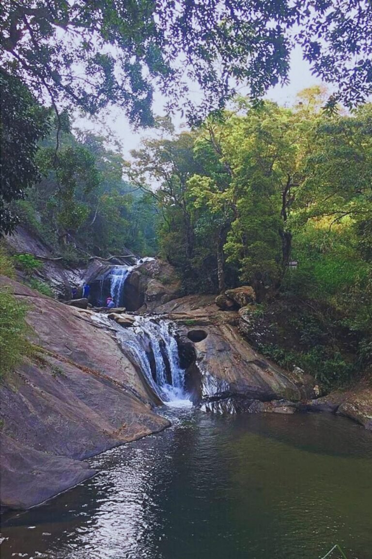 Bambarakiri Ella waterfall in Sri Lanka surrounded by green forest
