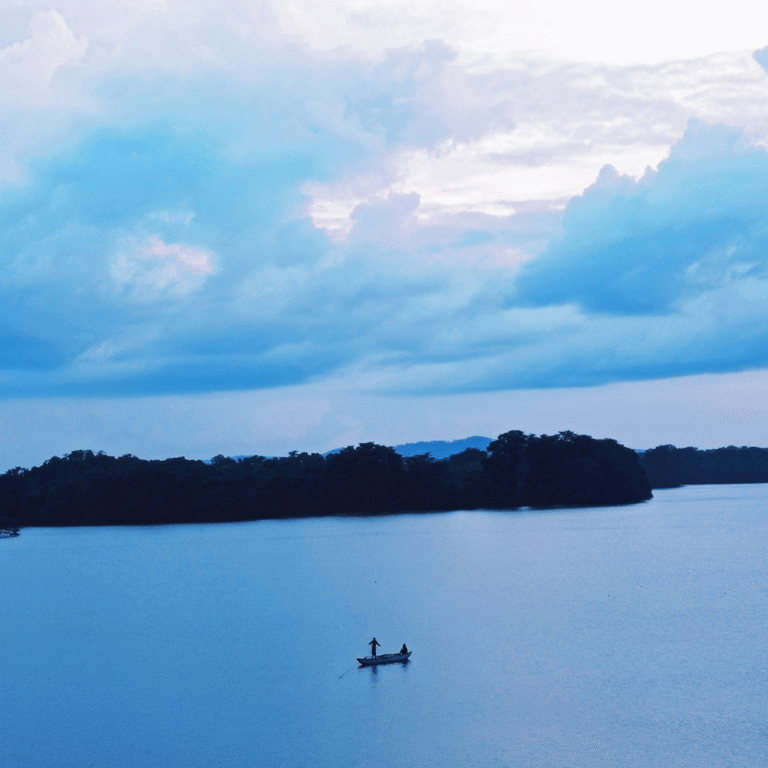 Blue skies and serene water at Chandrika Wewa