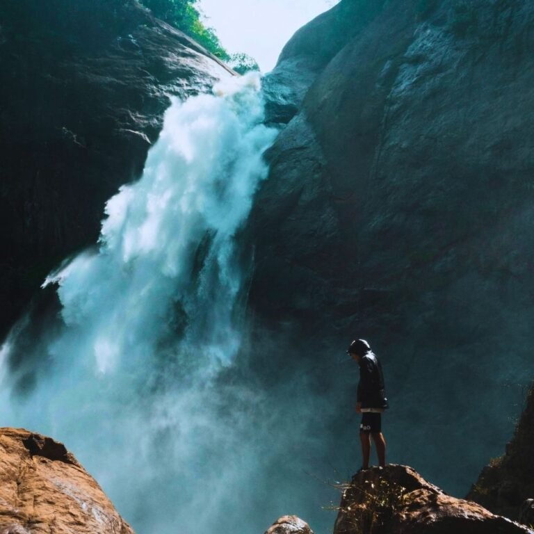 Close-up of water flowing over the rocks at Dunhinda Falls