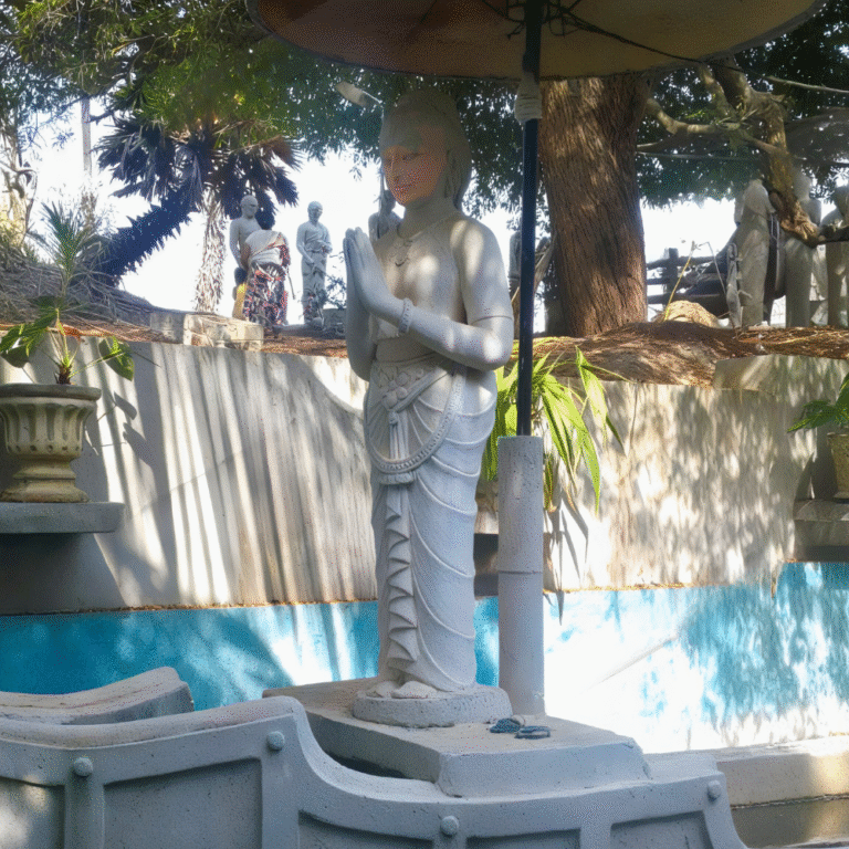 Sacred Buddhist site with statues and pagoda Muhudu Maha Viharaya