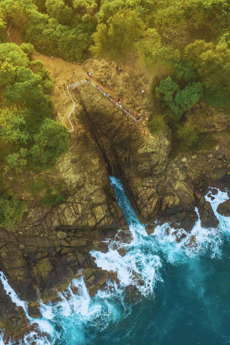 Ocean waves creating a spectacular water spout at Hummanaya