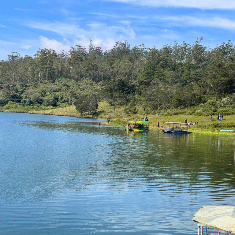 Green hills reflecting on Kande Ela Reservoir waters