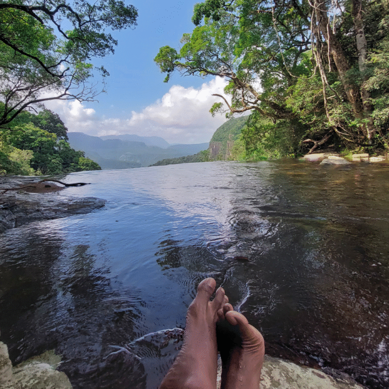 Relaxing by Knuckles Infinity Pool with mountain backdrop
