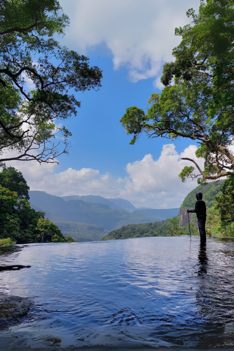 Tourists enjoying Knuckles Infinity Pool amidst natural landscapes