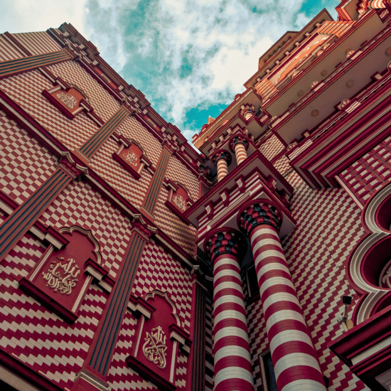 Famous red and white patterned mosque in Sri Lanka
