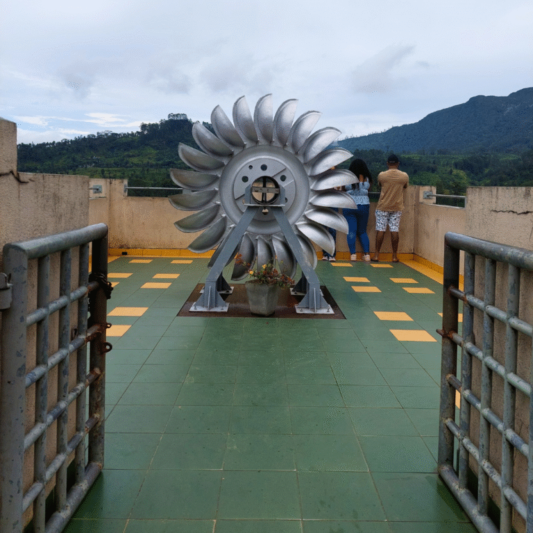 St. Clair Falls cascading through lush green hills in Sri Lanka