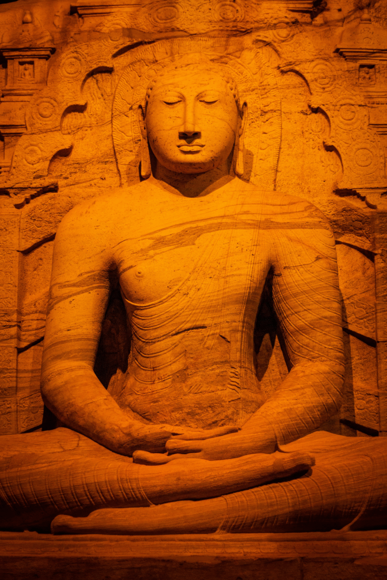 Seated Buddha statue carved from granite at Gal Viharaya