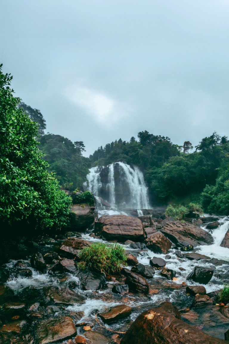 galboda waterfall flowing through tropical rainforest
