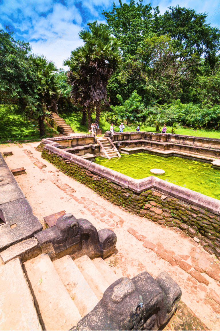Tourists visiting Kumara Pokuna ancient water pool