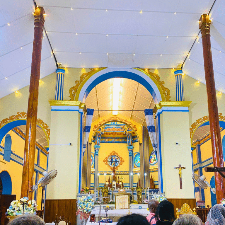 Catholic devotees praying at Madu Church