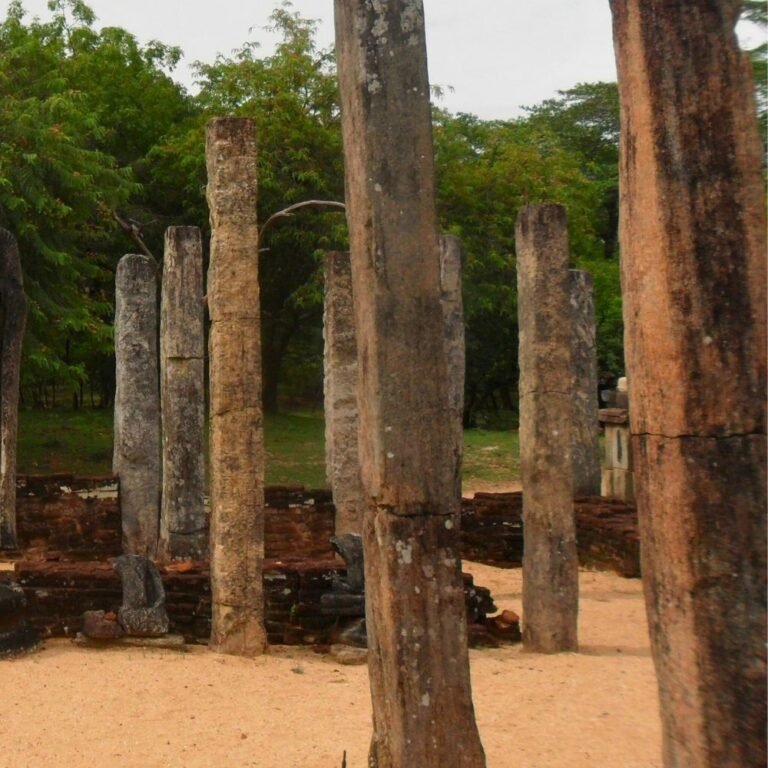 Front view of the Atadage temple surrounded by ruins