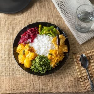 Traditional Sri Lankan rice and curry served on a plate