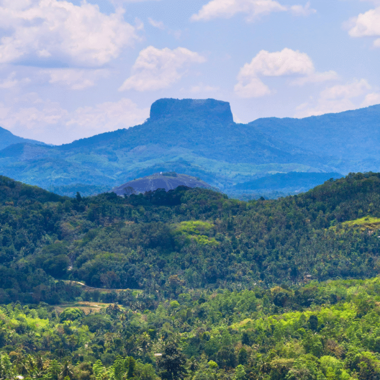 Bible Rock seen from distance across lush valleys