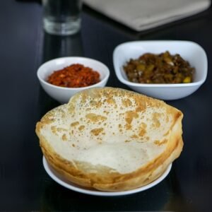 Traditional Sri Lankan hoppers with side curries