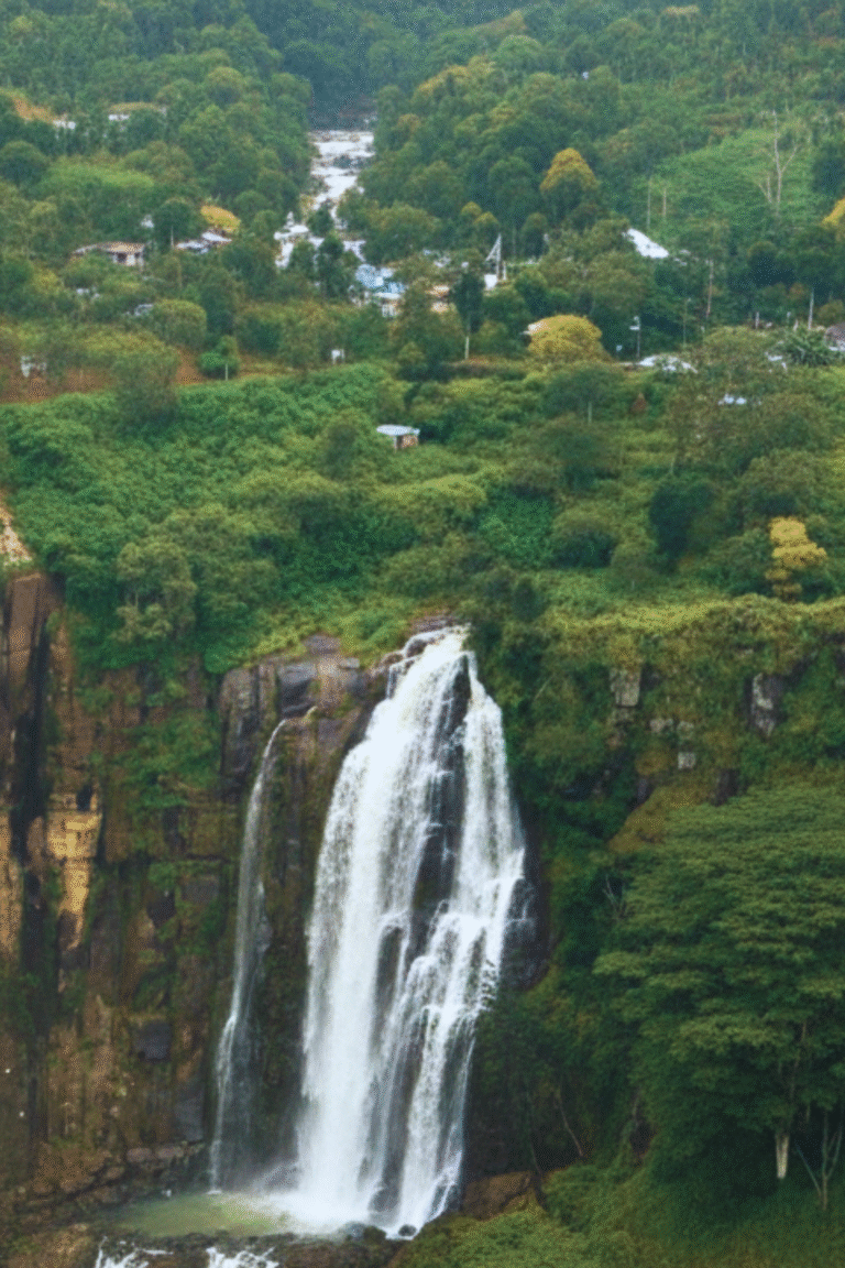 Hunnasgiriya Waterfall surrounded by lush greenery in Sri Lanka