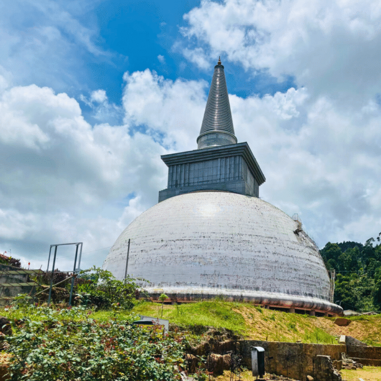 Kotmale Maha Seya white stupa with blue sky background