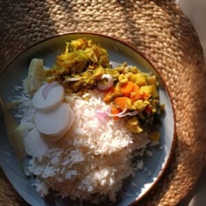 Colorful Sri Lankan rice and curry meal with spicy flavors