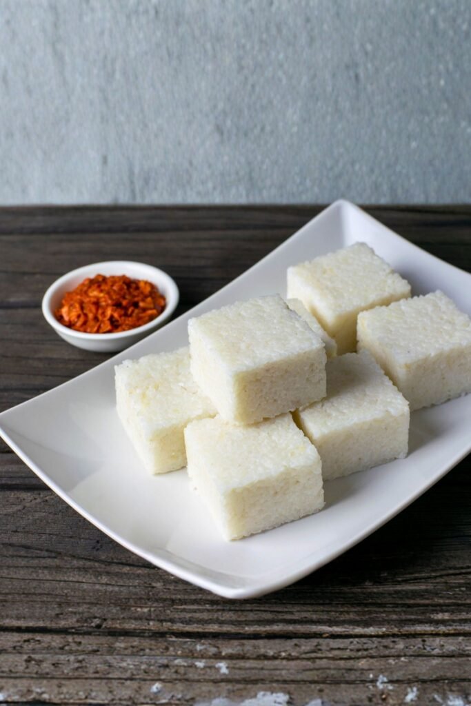 Traditional Sri Lankan milk rice served with lunu miris
