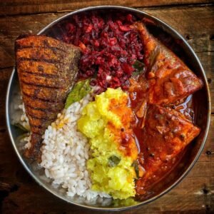 traditional Sri Lankan fish curry served with rice
