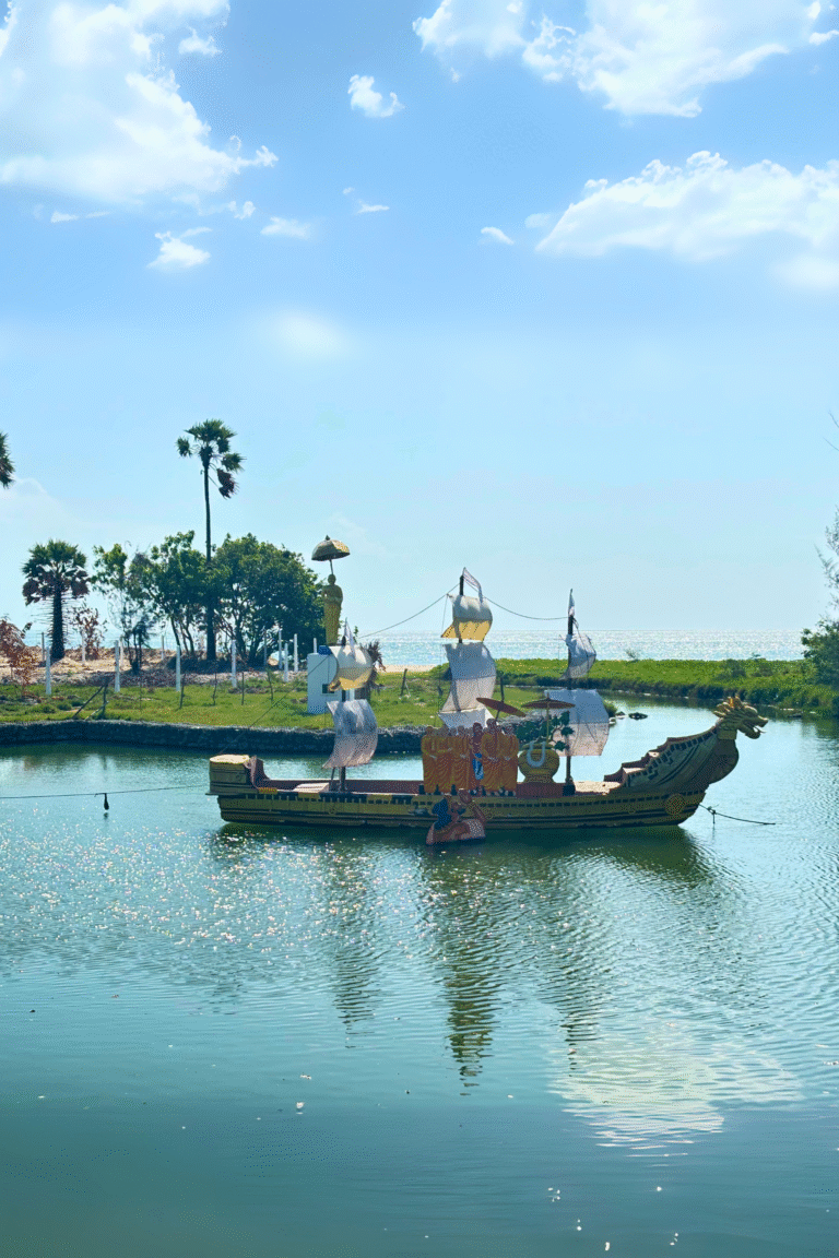 Coastal temple surrounded by blue ocean near Dambakola Patuna