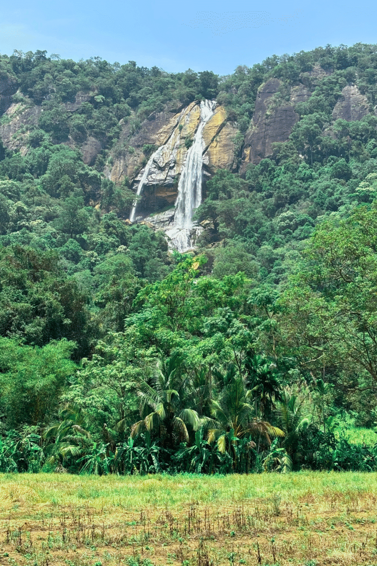 Diyavini Ella waterfall amidst tropical rainforest