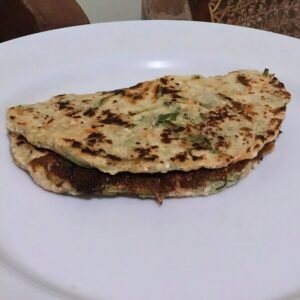 Sri Lankan fish ambulthiyal wrapped in fresh roti