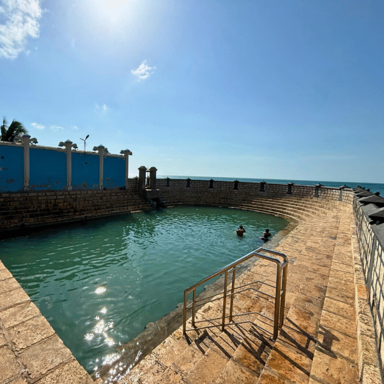 Tourists enjoying a bath at Keerimalai Hot Springs in Jaffna