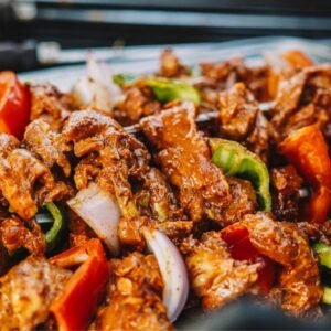 Pork curry with rich red gravy in Sri Lanka