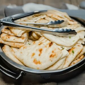 Freshly baked naan roti served in Sri Lanka