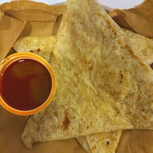 Homemade egg roti folded and ready to serve