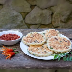 Coconut flatbread pol roti with curry side dish