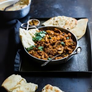 Soft naan roti bread served with curry