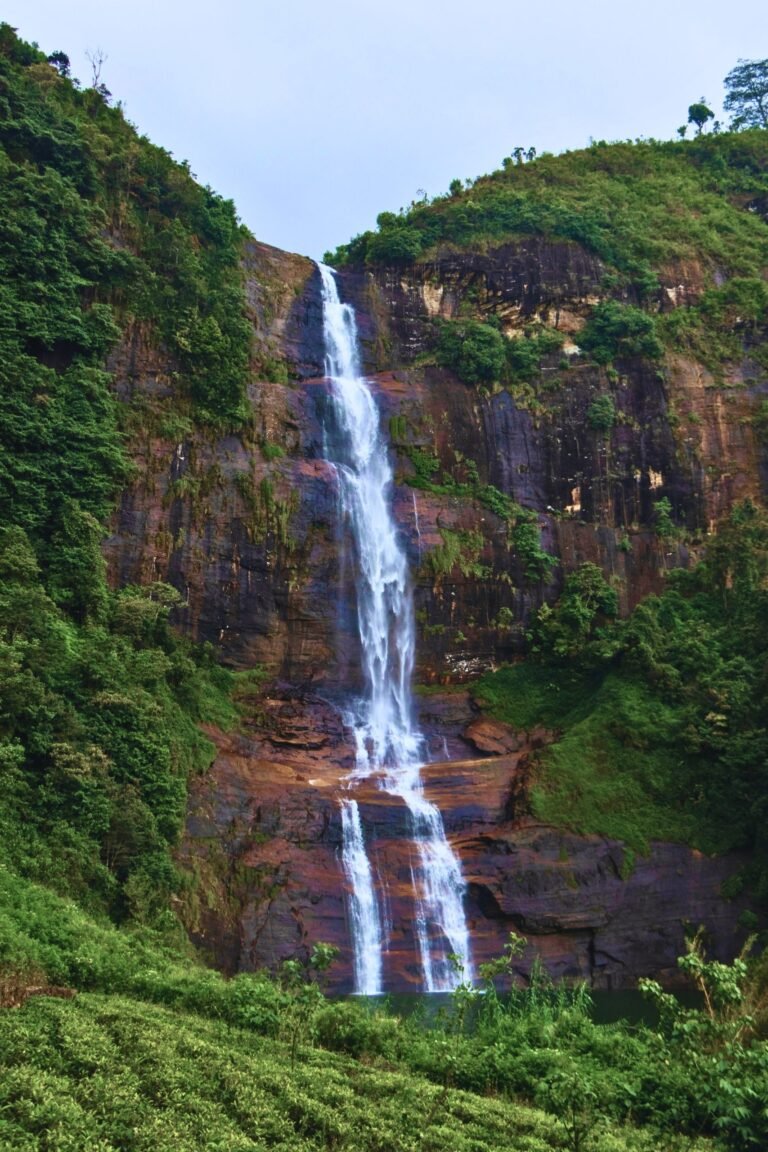 Gartmore Falls cascading through lush greenery in Nuwara Eliya