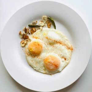 Homemade Sri Lankan omlet with sunny side up egg